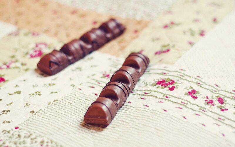 chocolate bars on floral fabric