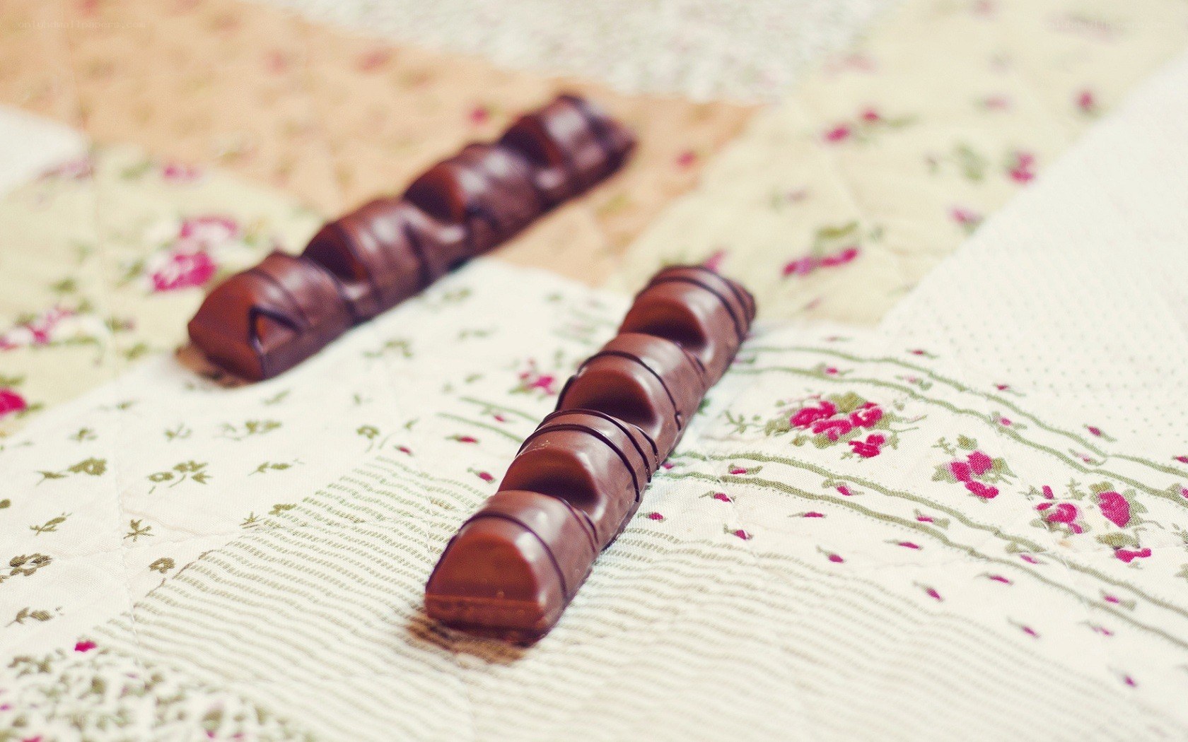 chocolate bars on floral fabric