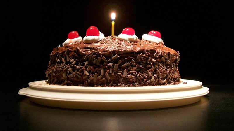 Chocolate Birthday Cake — Brown, Celebratory, Night, Photograph, Candle, Cherries, Whipped Cream