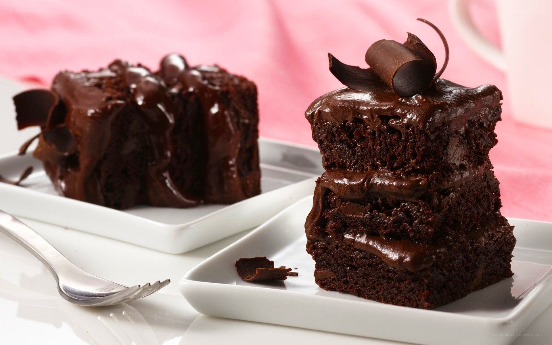 Chocolate cake slices on plates