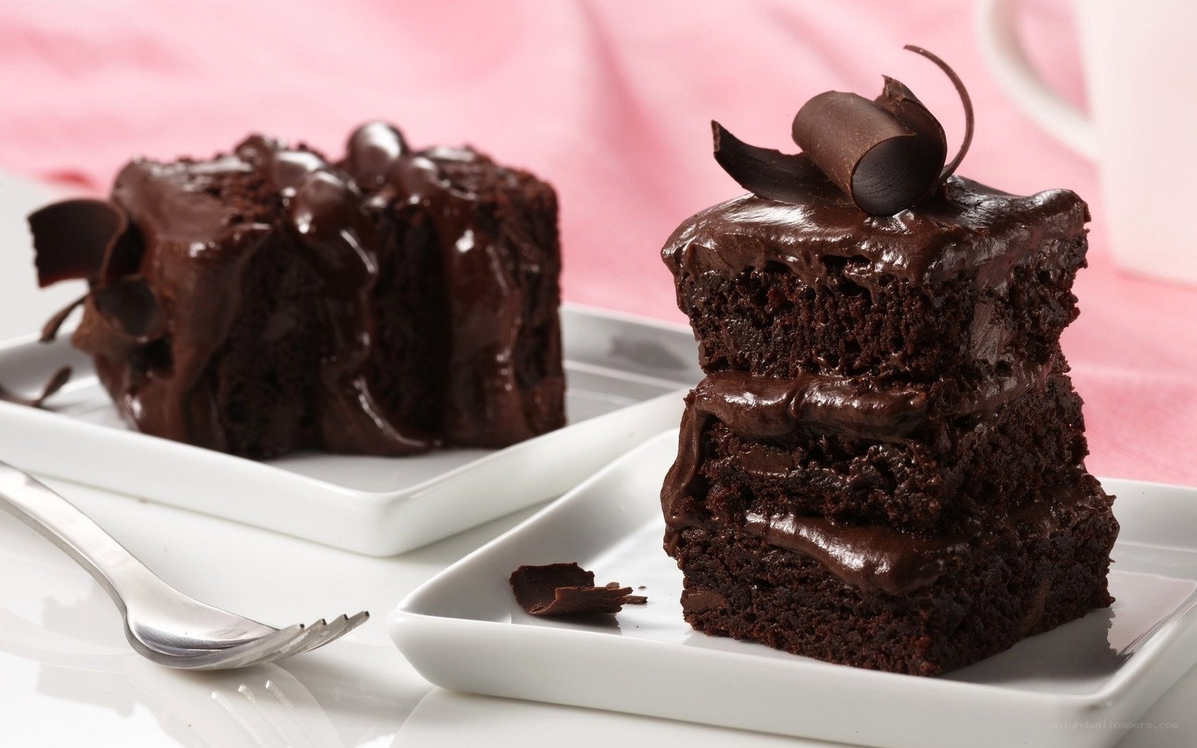 Chocolate cake slices on plates
