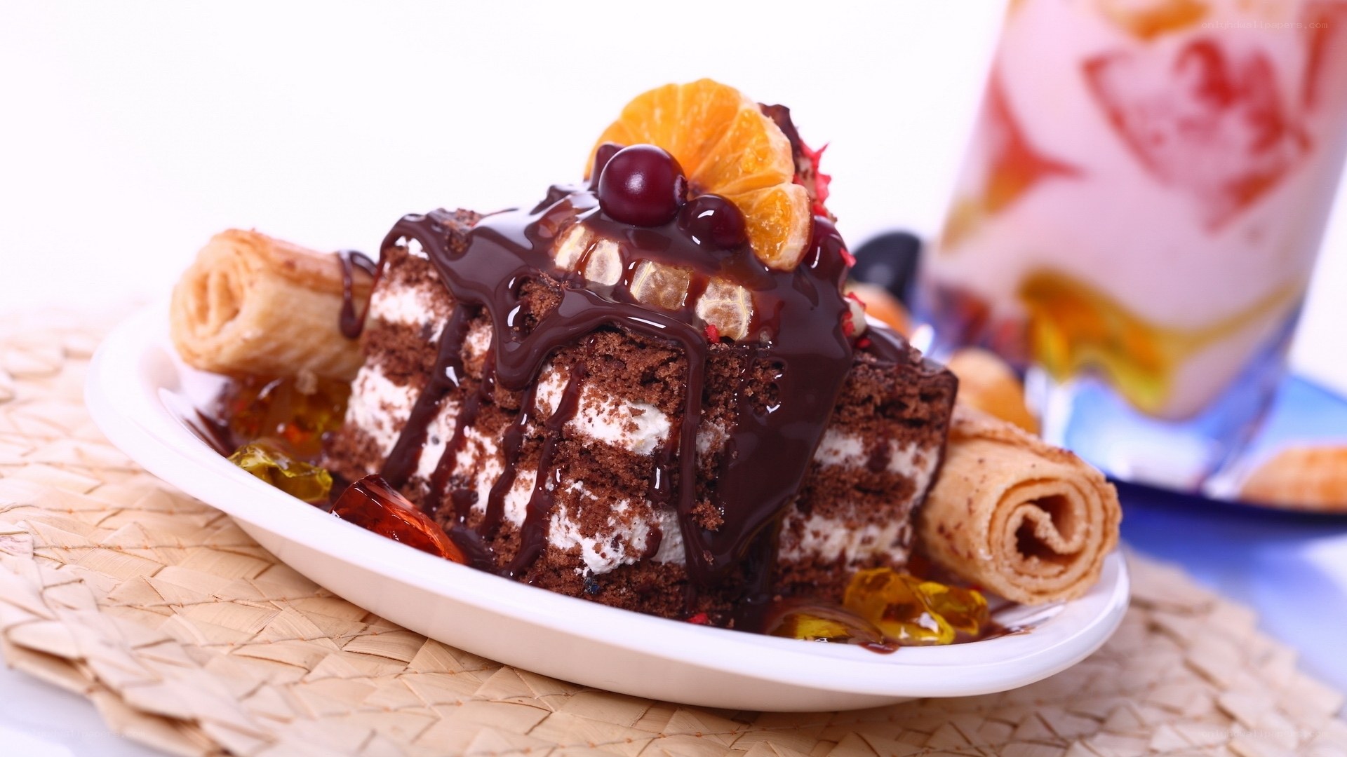 Chocolate cake with fruit and cream