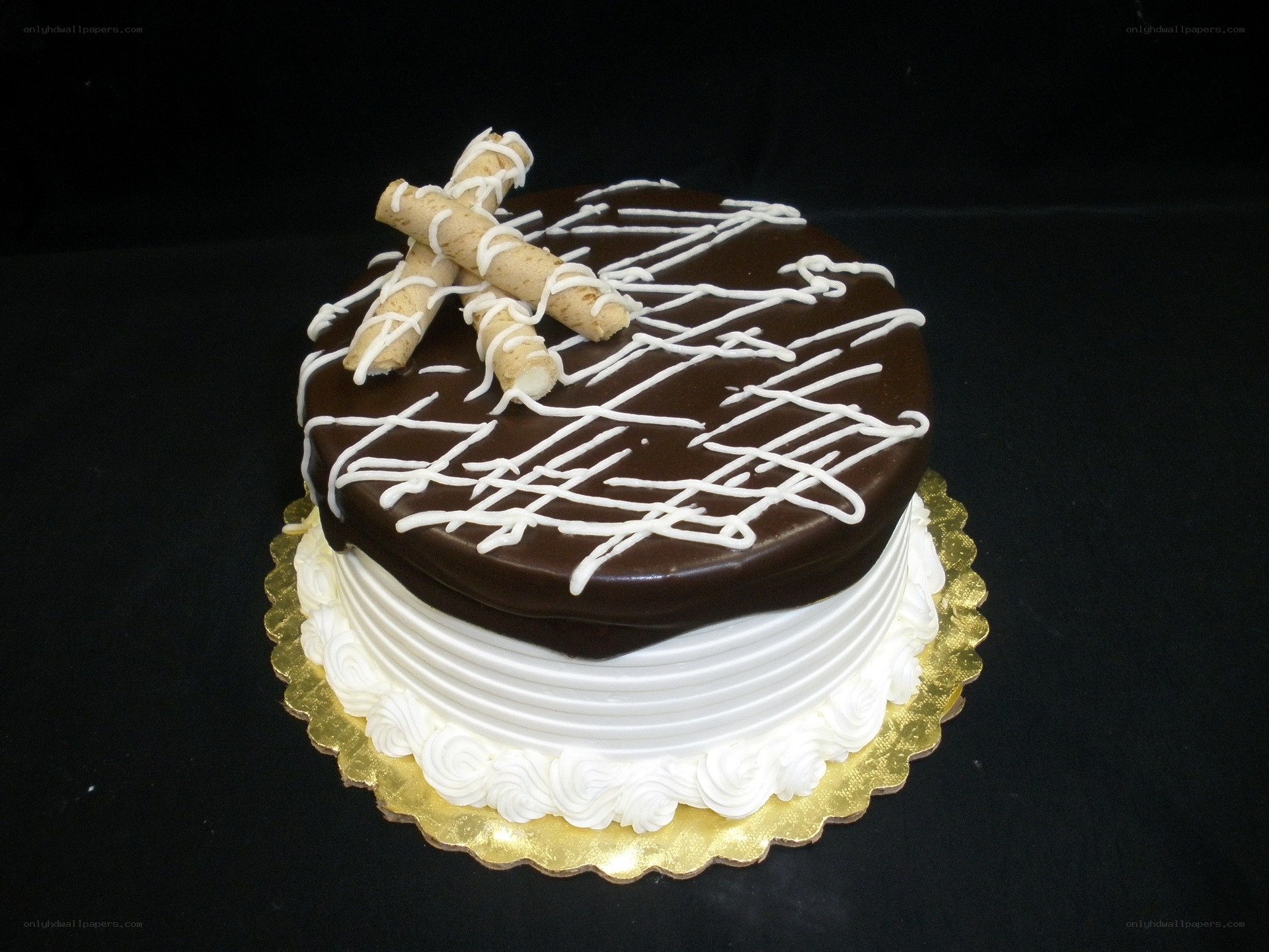 chocolate cake with white drizzle