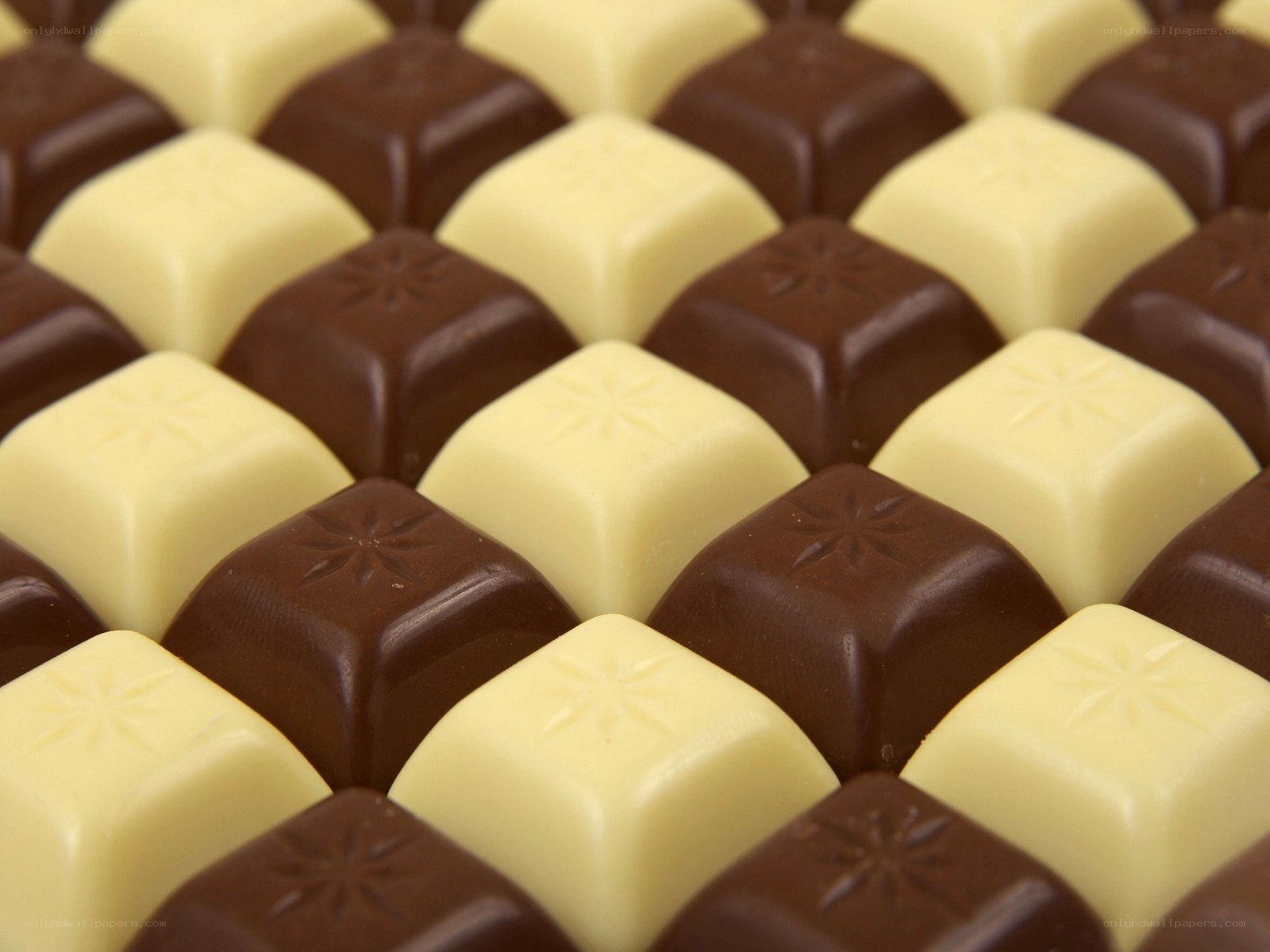 chocolate candies in a checkerboard pattern