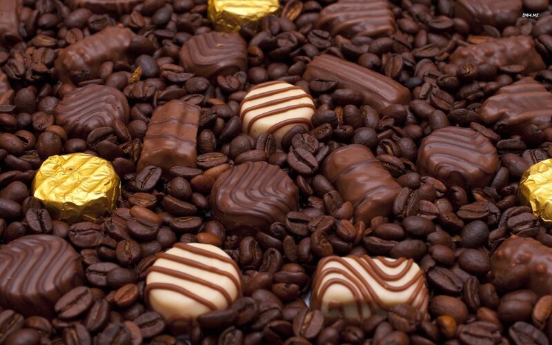 Chocolate Candies on Coffee Beans — Brown