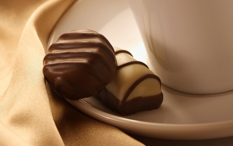 Chocolate Candies on Saucer — Brown, Calm