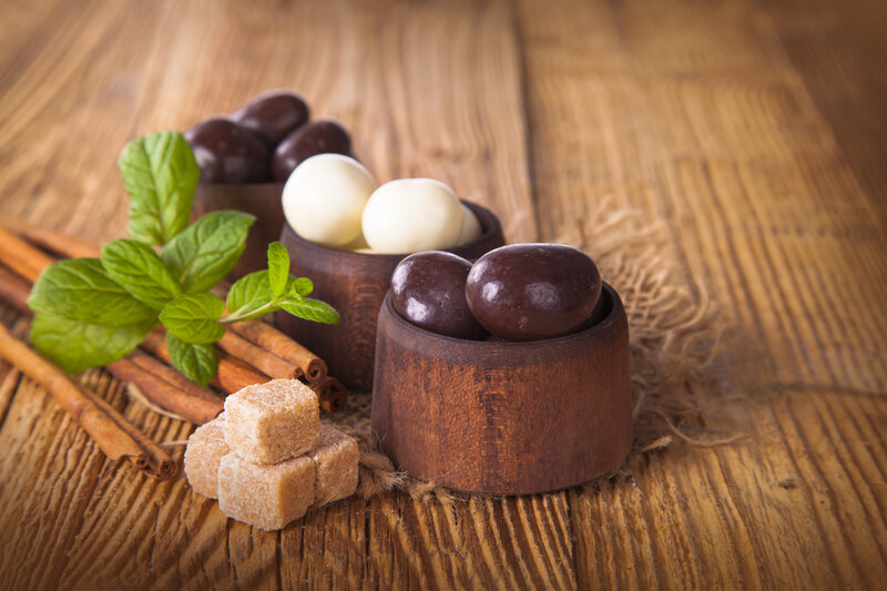 Chocolate Candies on Wood — Brown, Calm