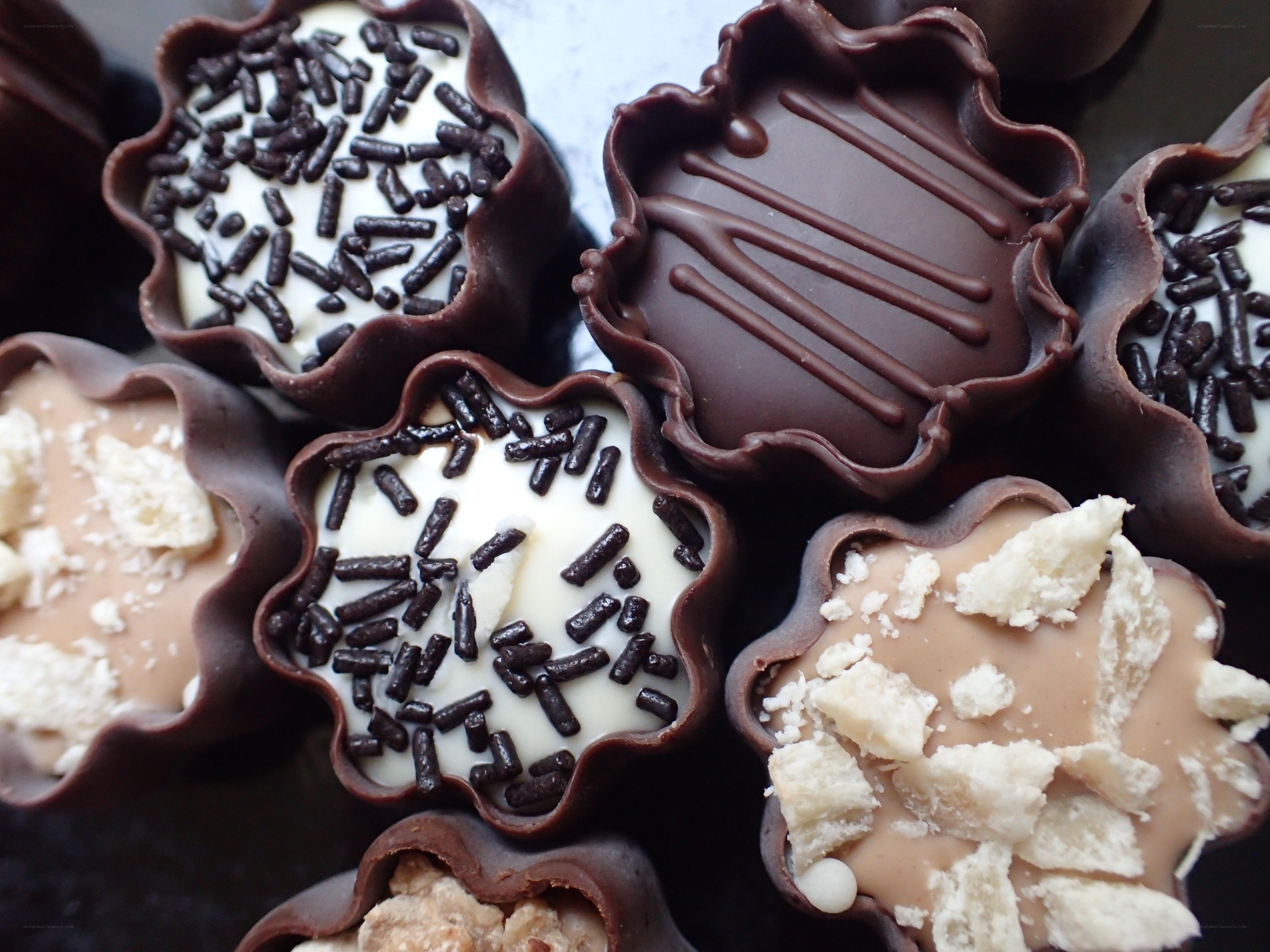 chocolate candies with toppings