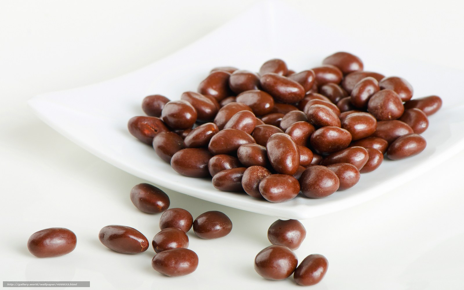 chocolate-covered candies on plate