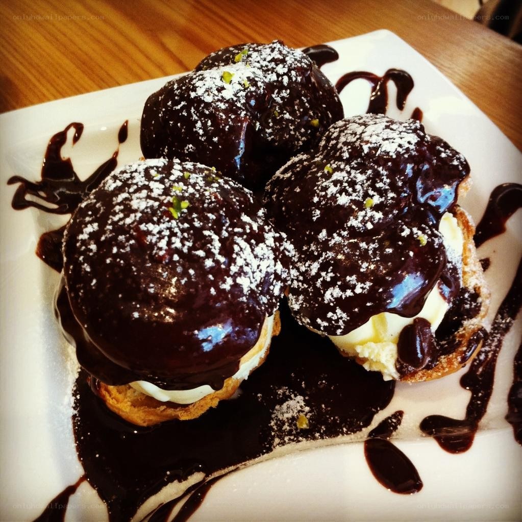 Chocolate-covered cream puffs