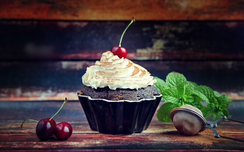 Chocolate Cupcake with Cherry — Brown, Dramatic, Photograph