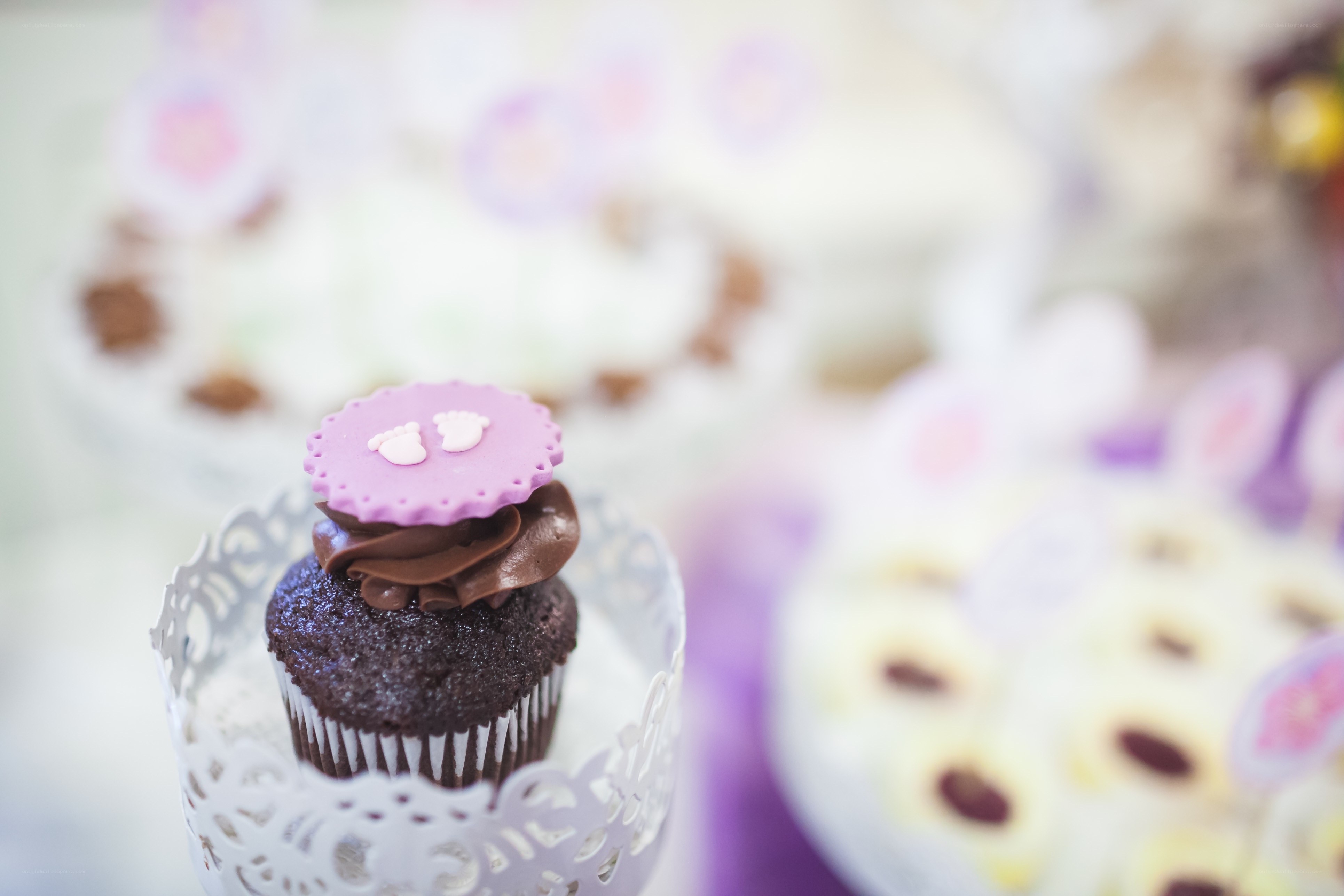 chocolate cupcake with pink decoration