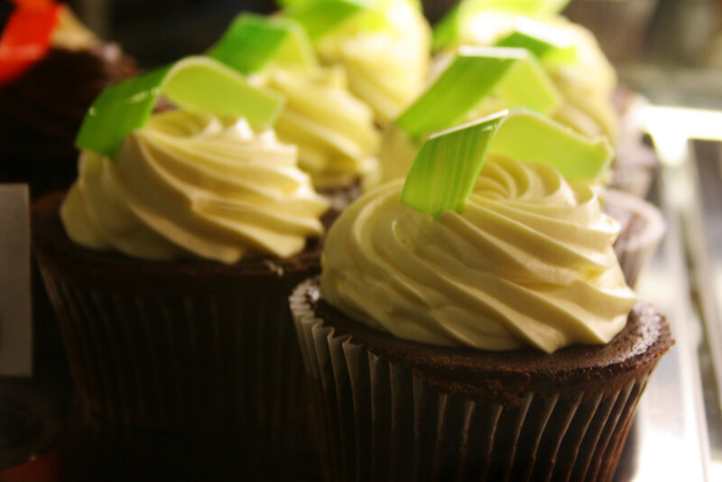 chocolate cupcakes with green garnish