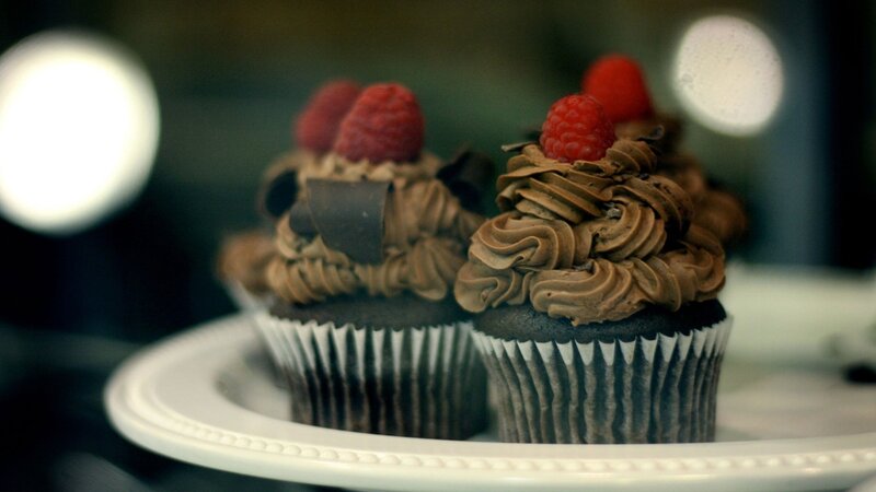 Chocolate cupcakes with raspberries