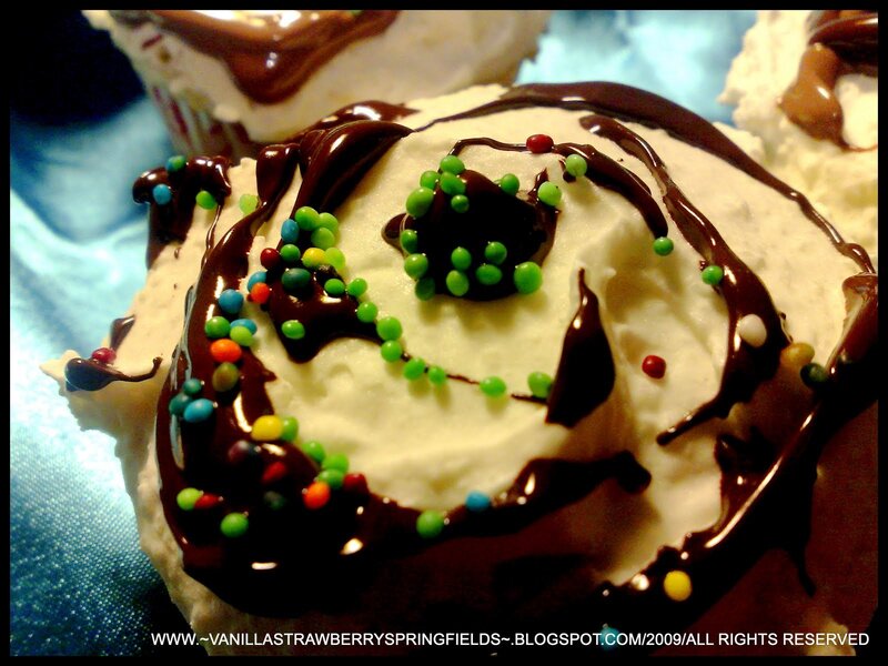 chocolate-drizzled cupcake