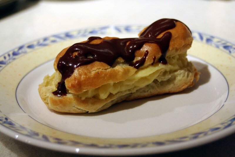 chocolate eclair on a plate