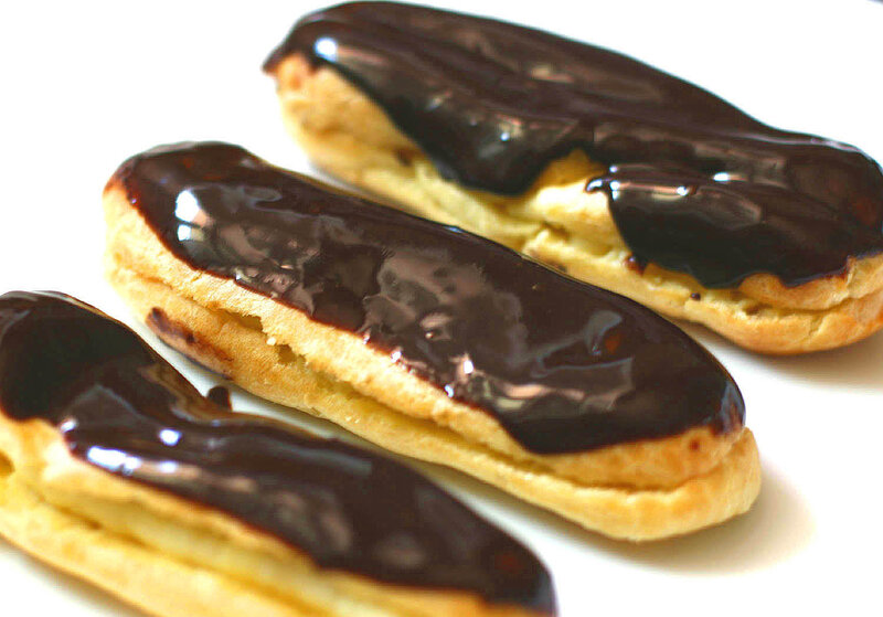 chocolate eclairs on white
