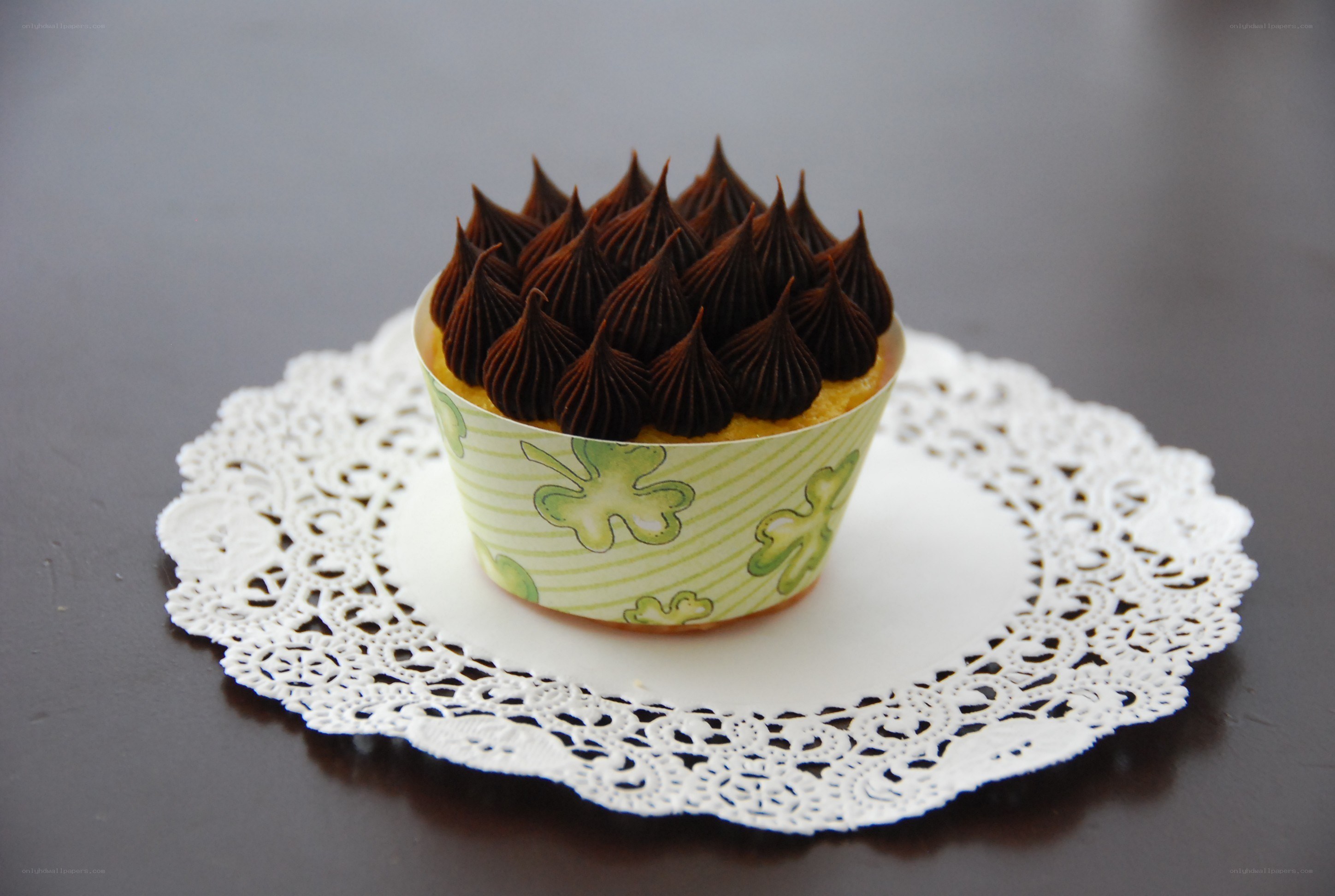 chocolate-frosted cupcake