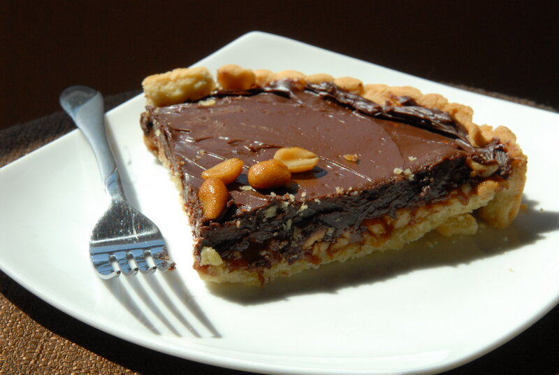 Chocolate peanut tart slice