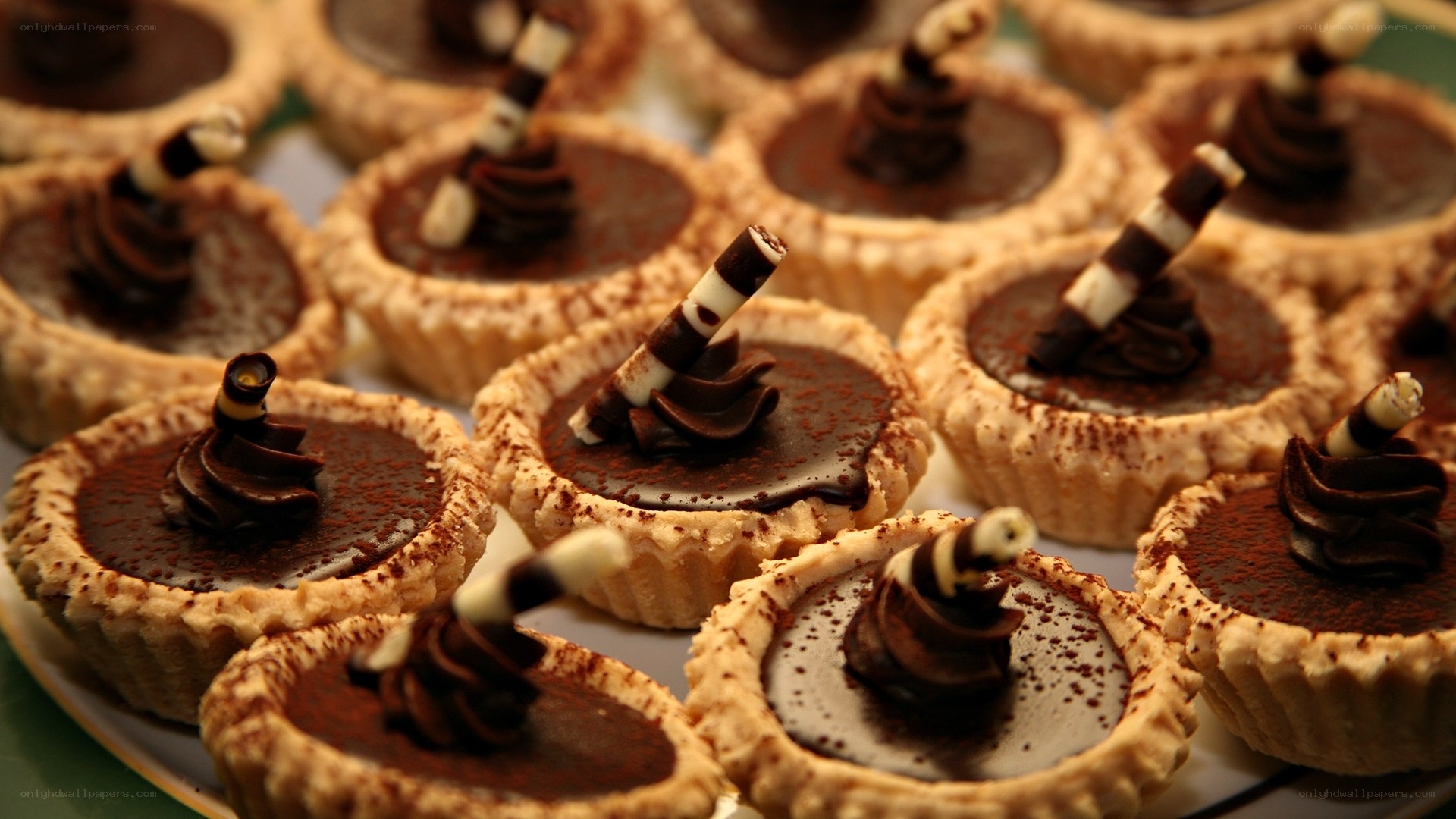 chocolate tartlets on a plate
