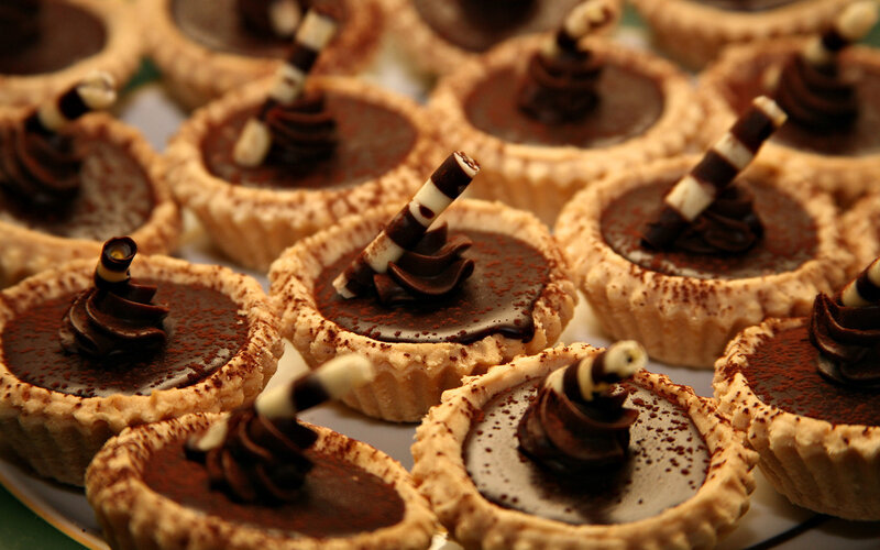 Chocolate Tarts on Plate — Brown