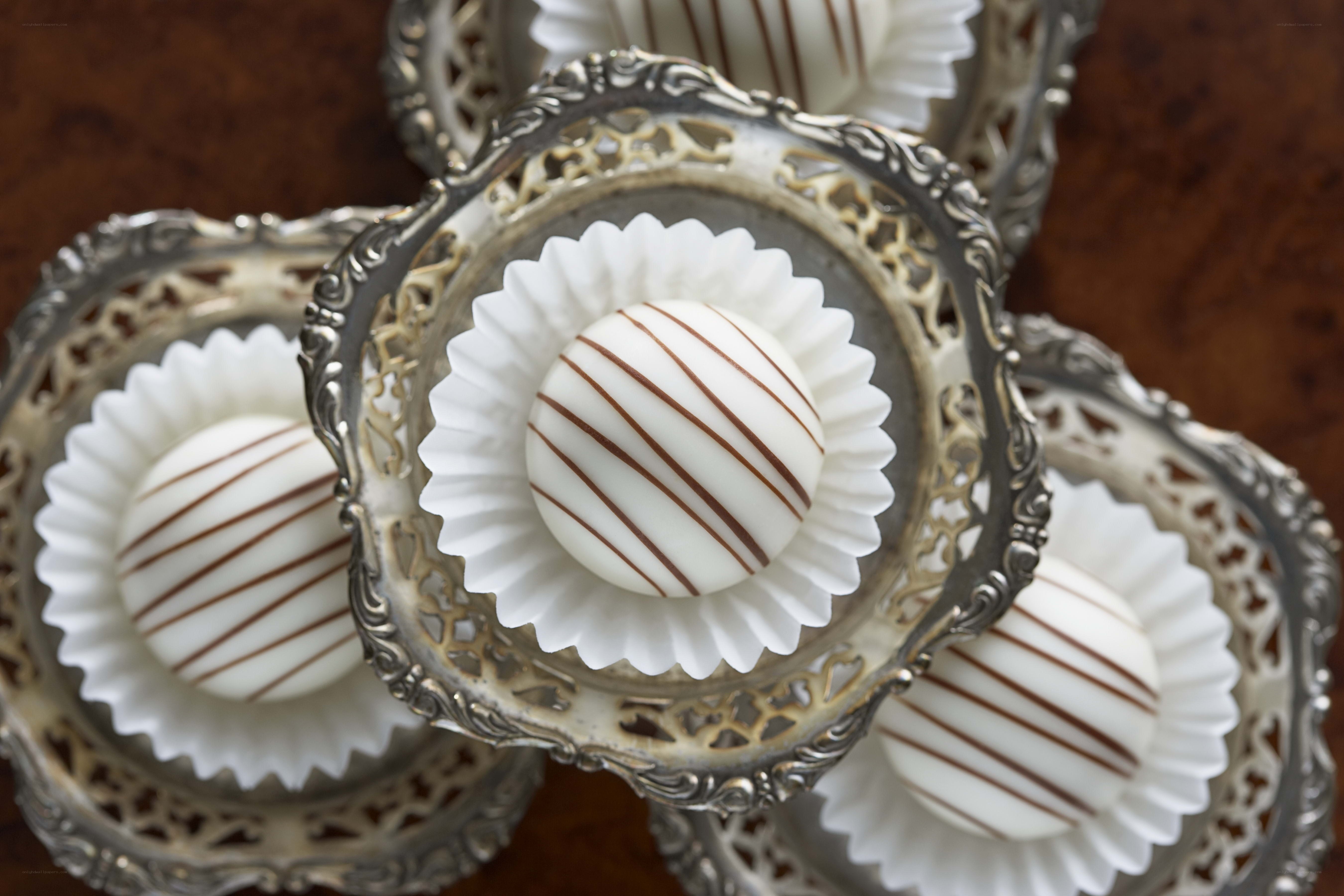 chocolate truffles in silver dishes