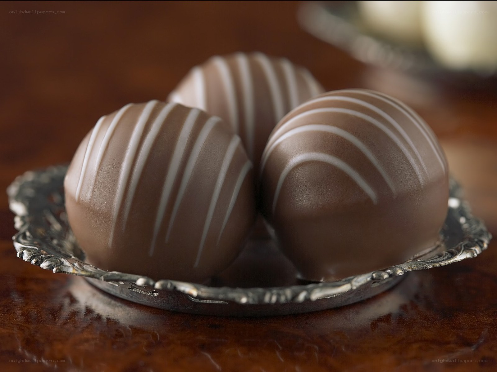 chocolate truffles on a silver dish