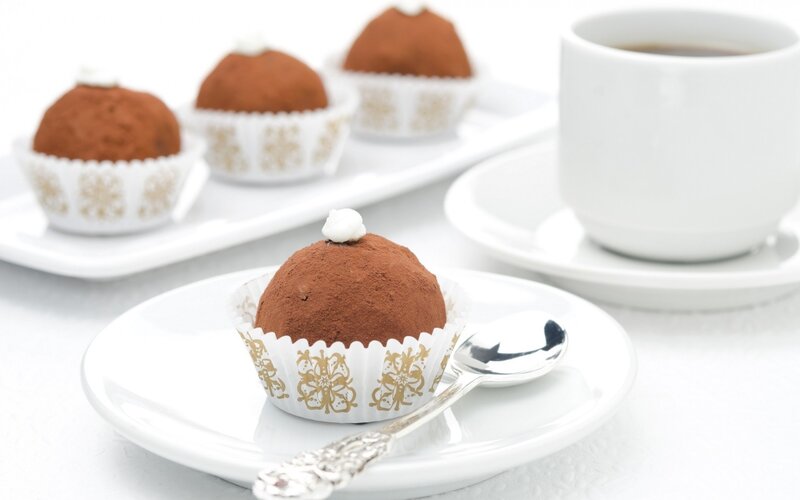 Chocolate Truffles on Plates — White