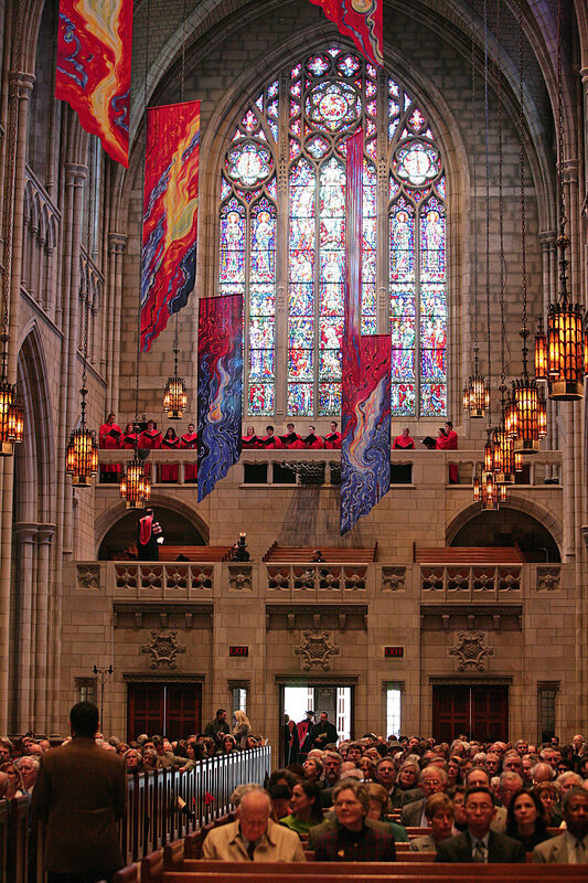 Choir in a cathedral with stained glass