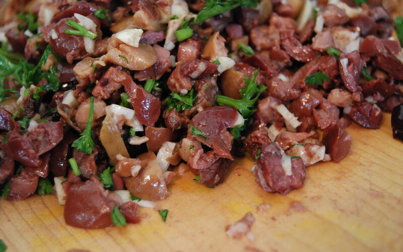 chopped meat salad on wood