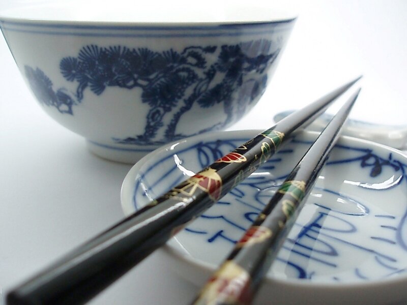 Chopsticks and bowl with blue design