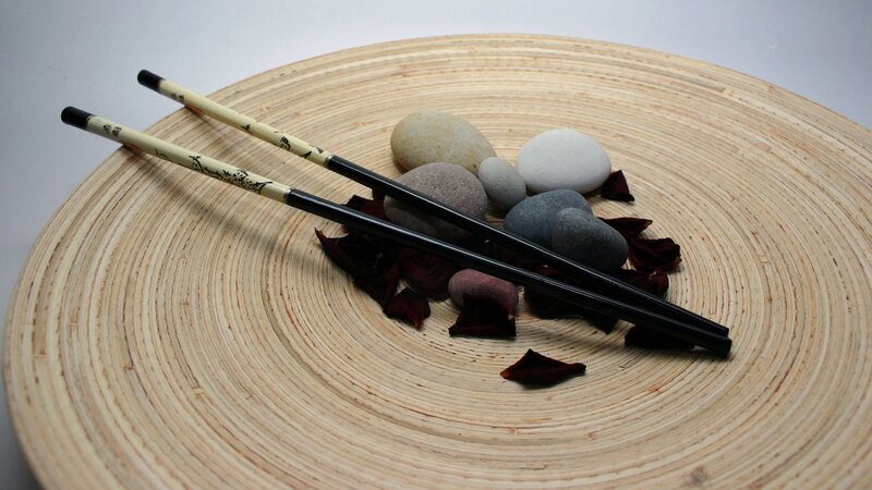Chopsticks on bamboo plate