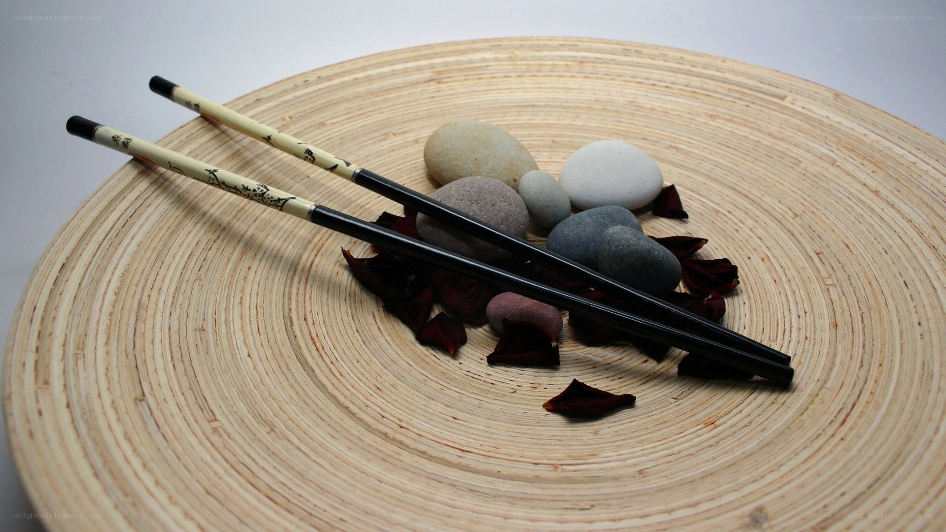 Chopsticks on bamboo plate