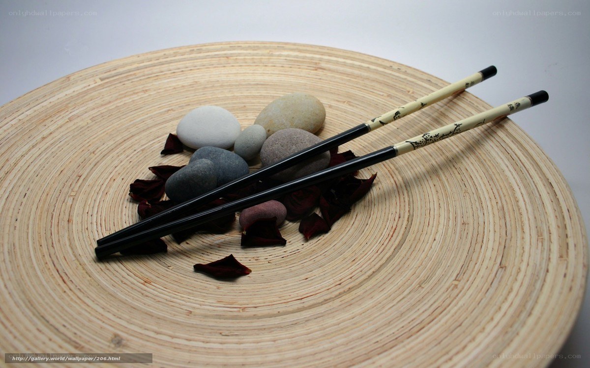 Chopsticks on wooden plate