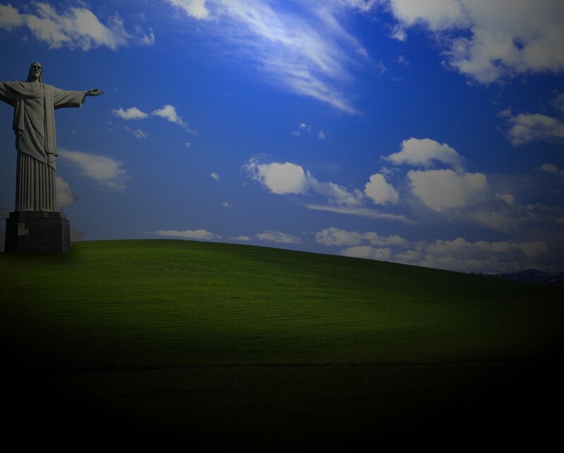 Christ the Redeemer on a green hill