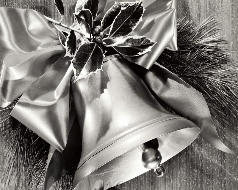 Christmas bell with holly and ribbon