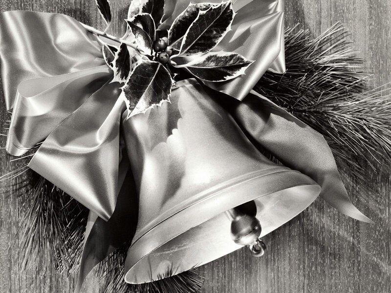 Christmas bell with holly and ribbon