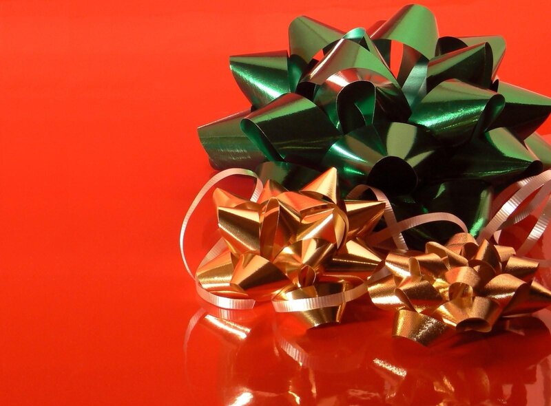 Christmas bows on red