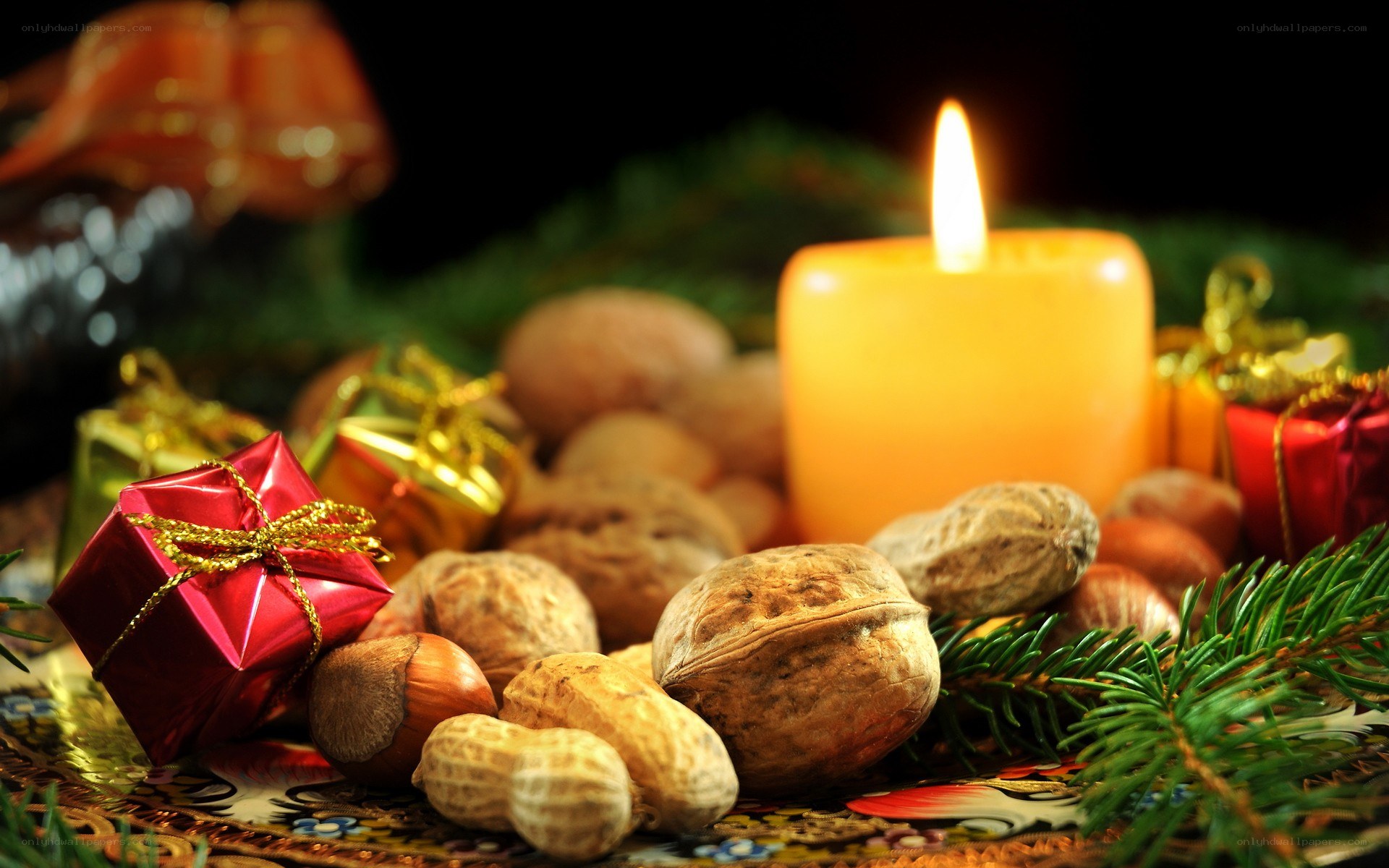 Christmas candle and nuts