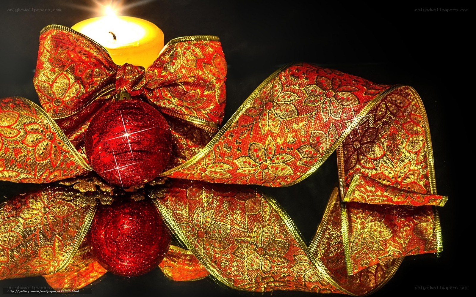 Christmas candle and ribbon
