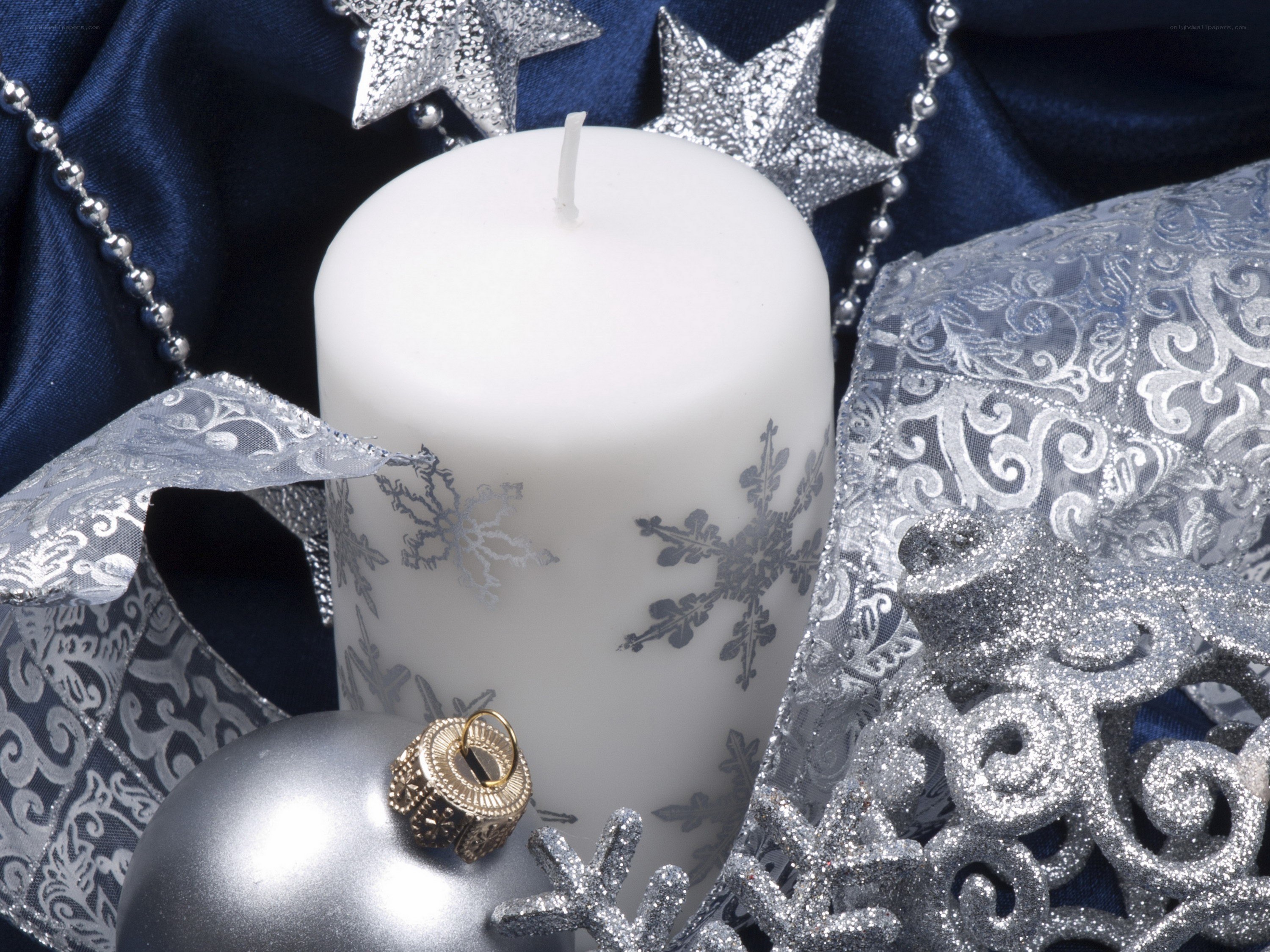 Christmas candle with ornaments