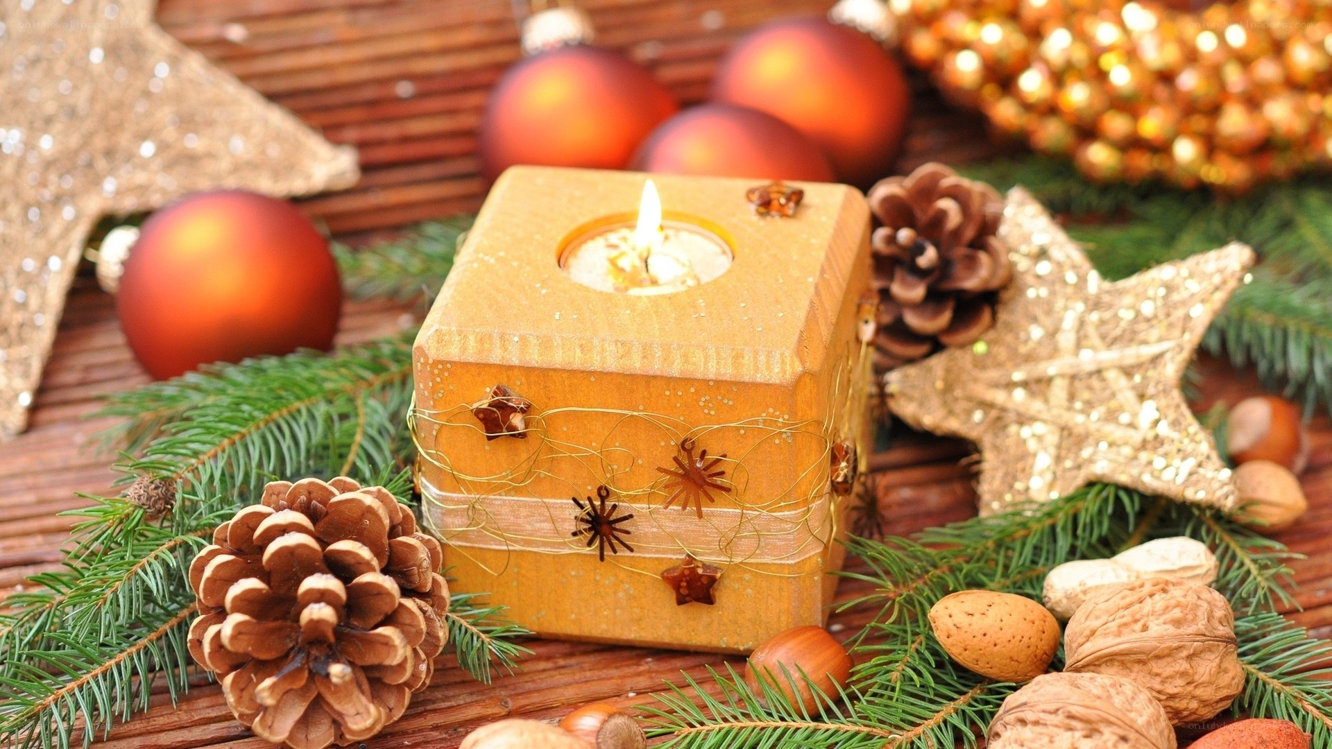 Christmas candle with ornaments
