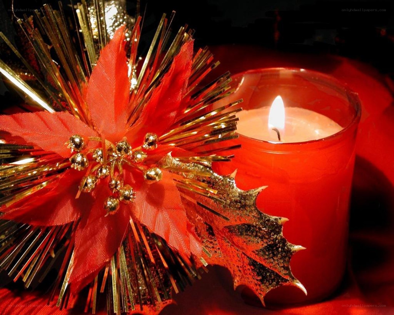 Christmas candle with poinsettia