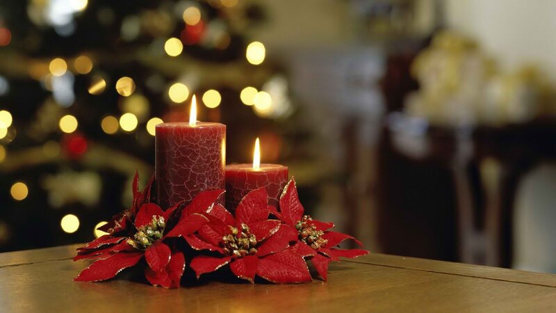 Christmas candles and poinsettias