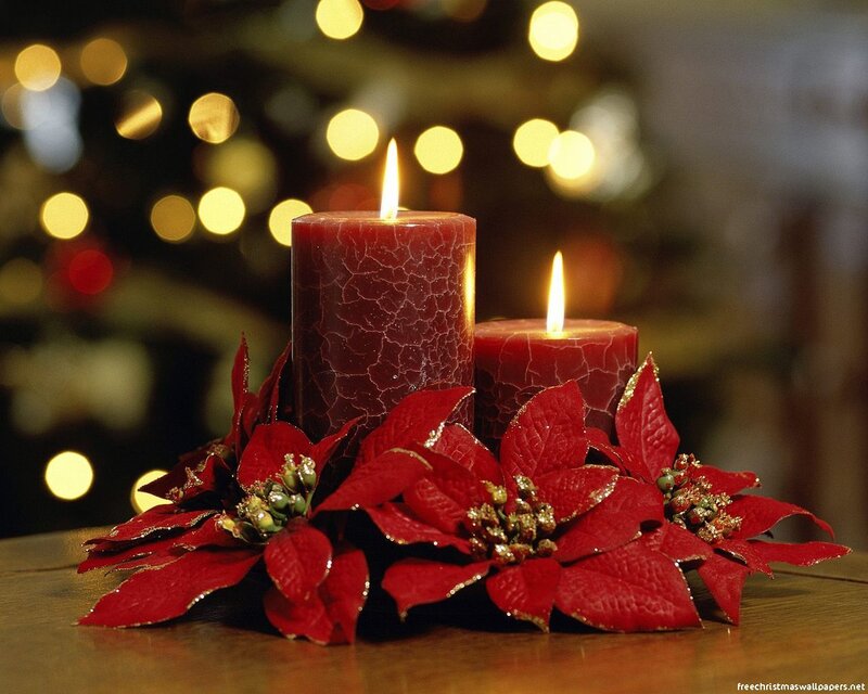 Christmas candles and poinsettias