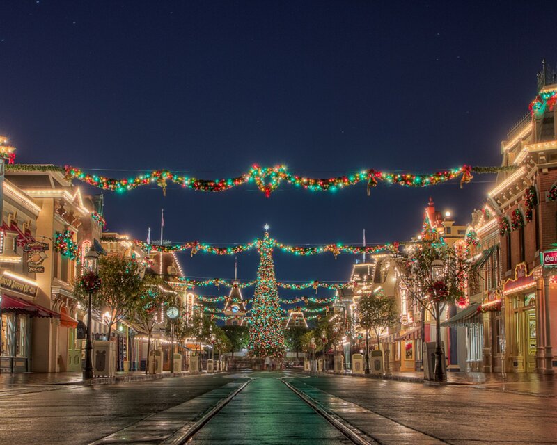 Christmas-decorated street at night