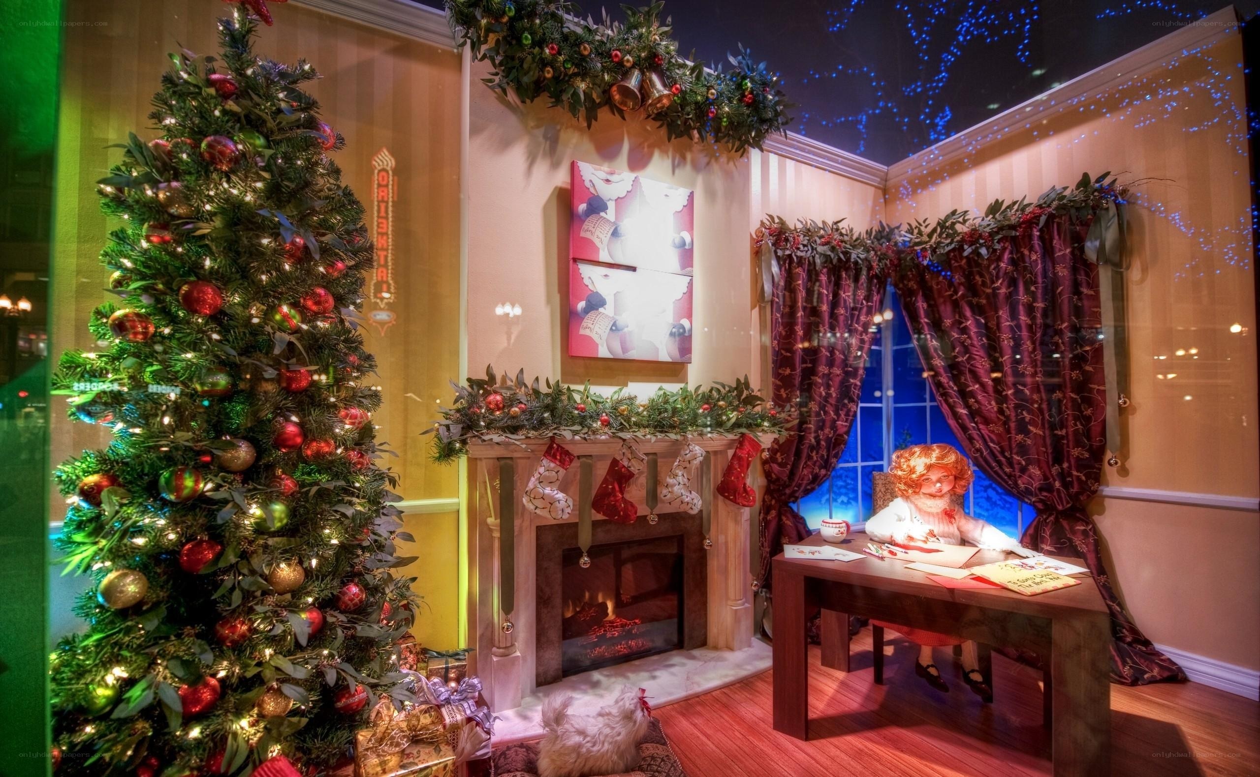 Christmas display with doll at desk