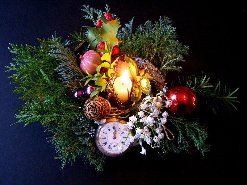 Christmas floral arrangement with candle