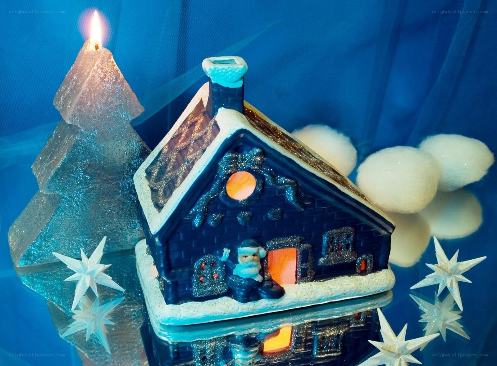 Christmas house with candle