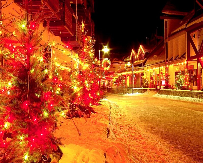 Christmas lights in snowy village